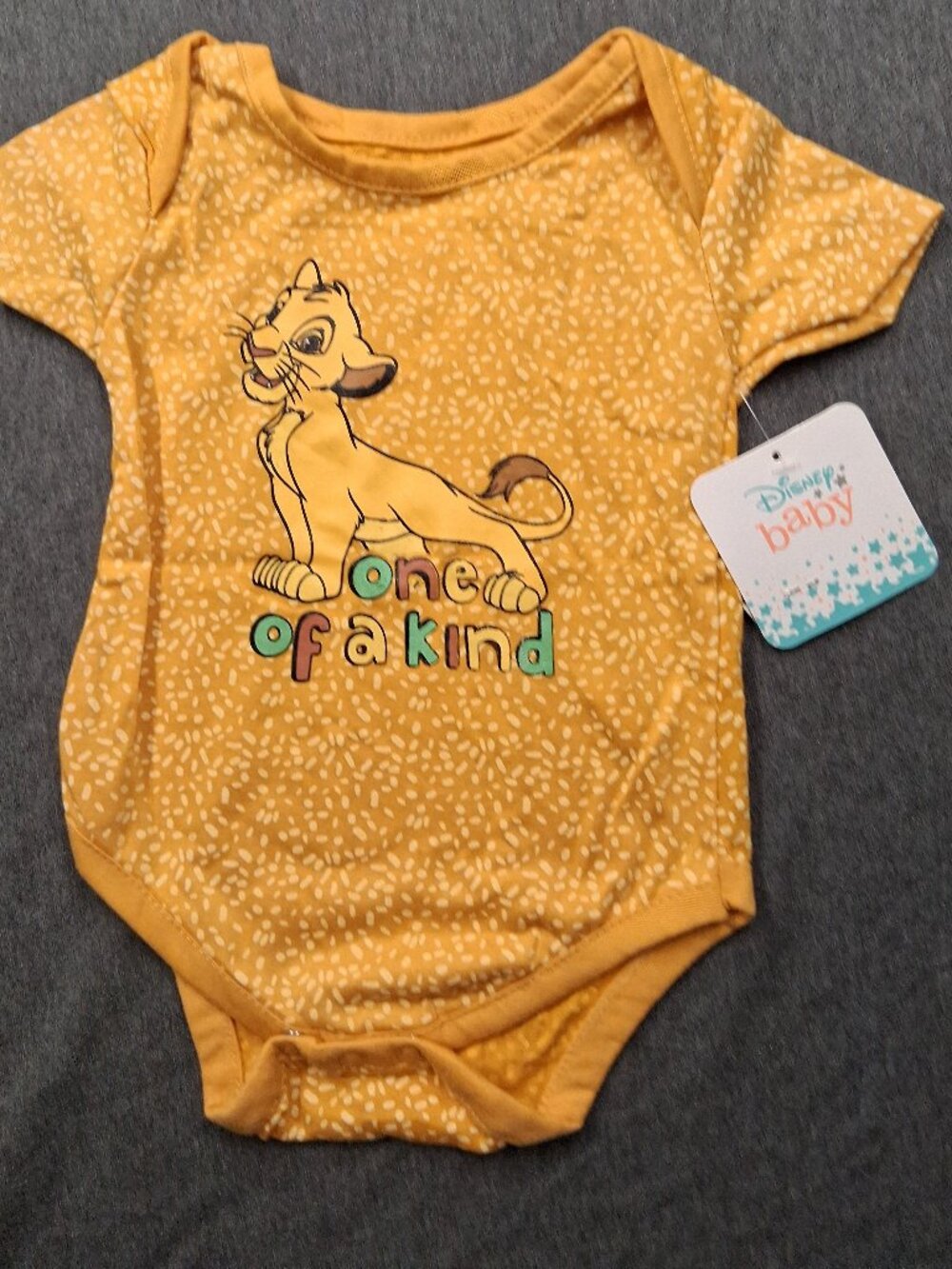 Disney girl/ boy onesie size 3/6 months Yellow new with tags